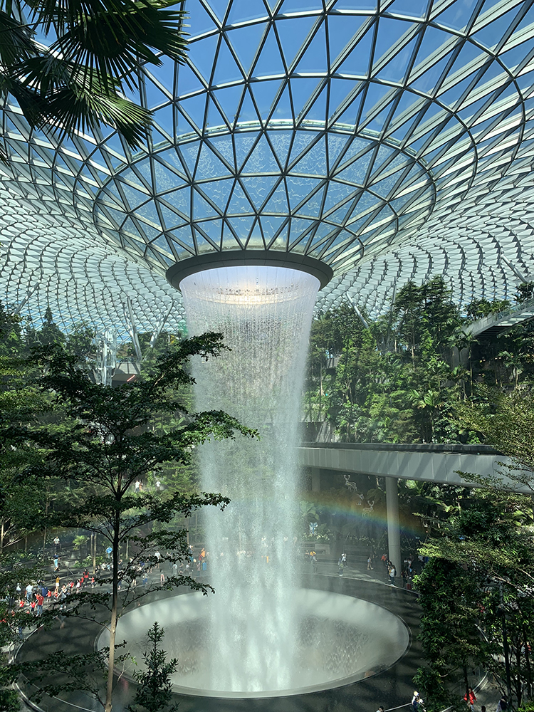 A fountain in a ceiling skylight.