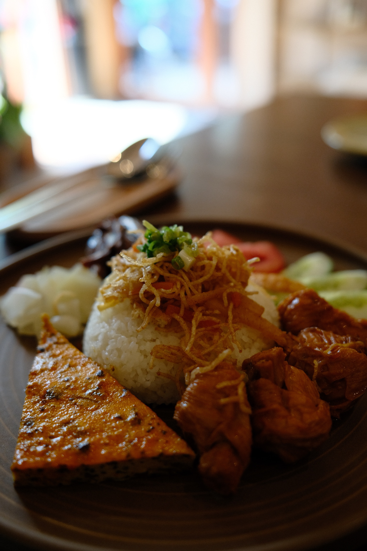 A plate of noodles and rice.
