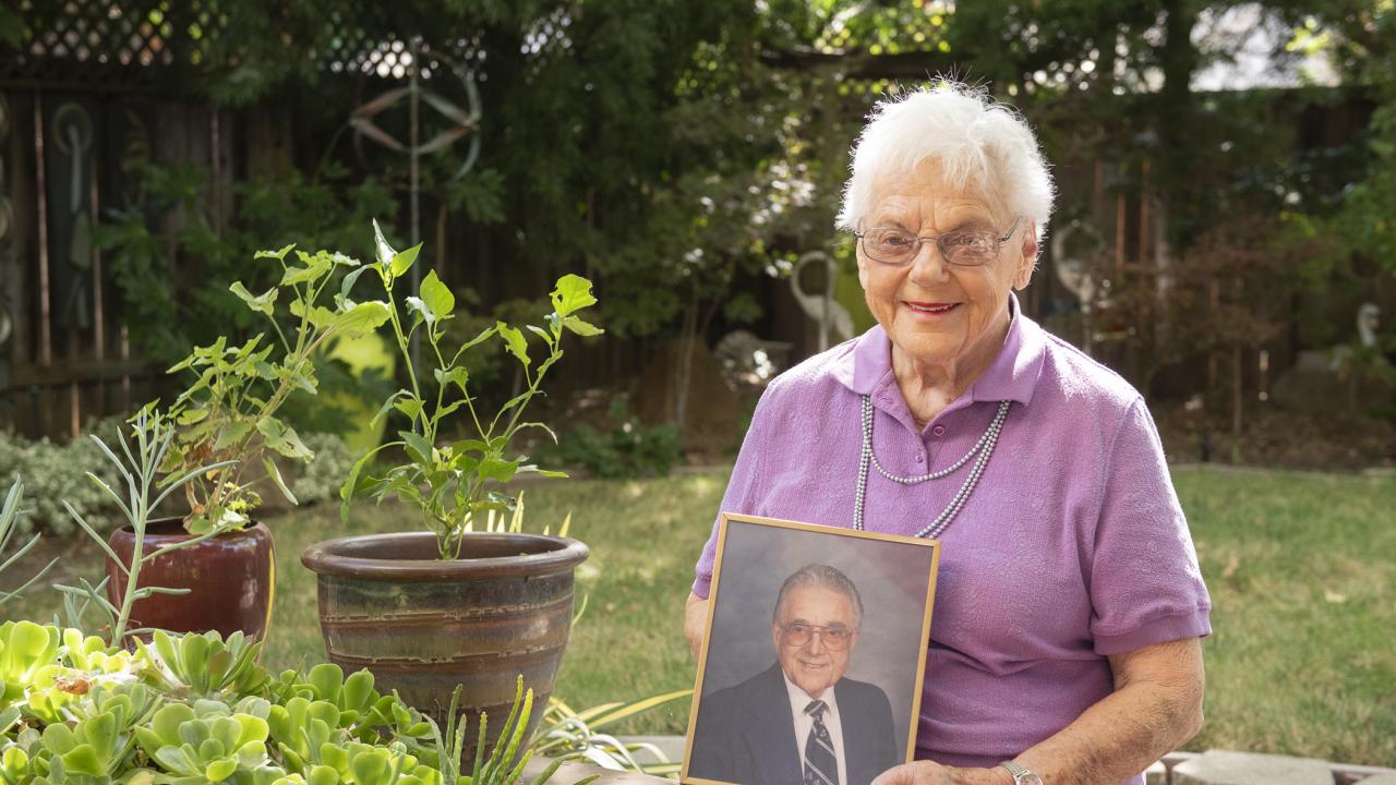 Annette Parker holds a photo of her late husband, Dr. Harold Parker '52. Annette Parker holds a photo of her late husband, Dr. Harold Parker '52.
