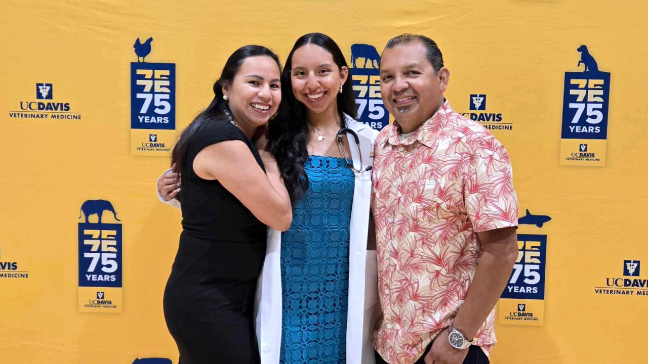 Arely Navarro with her parents.