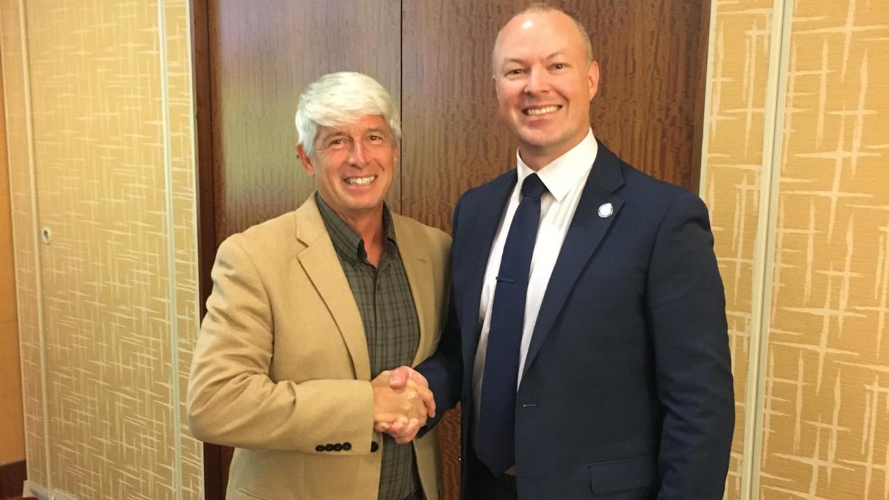UC Davis School of Veterinary Medicine Dean Mark Stetter congratulates Dr. Keith Rode on being elected president of the California Veterinary Medical Association.