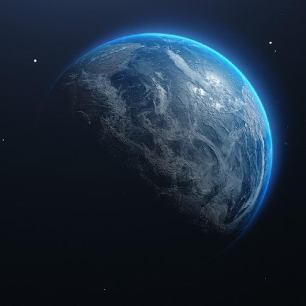 3D rendering of Earth half-lit with blue atmospheric glow and scattered stars