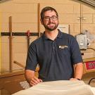 veterinarian standing by CT scanner